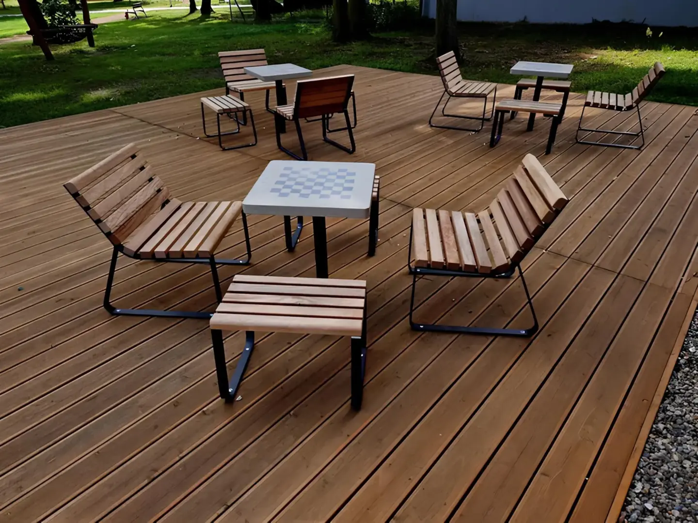 Stock photo rocking chair pavement trees square